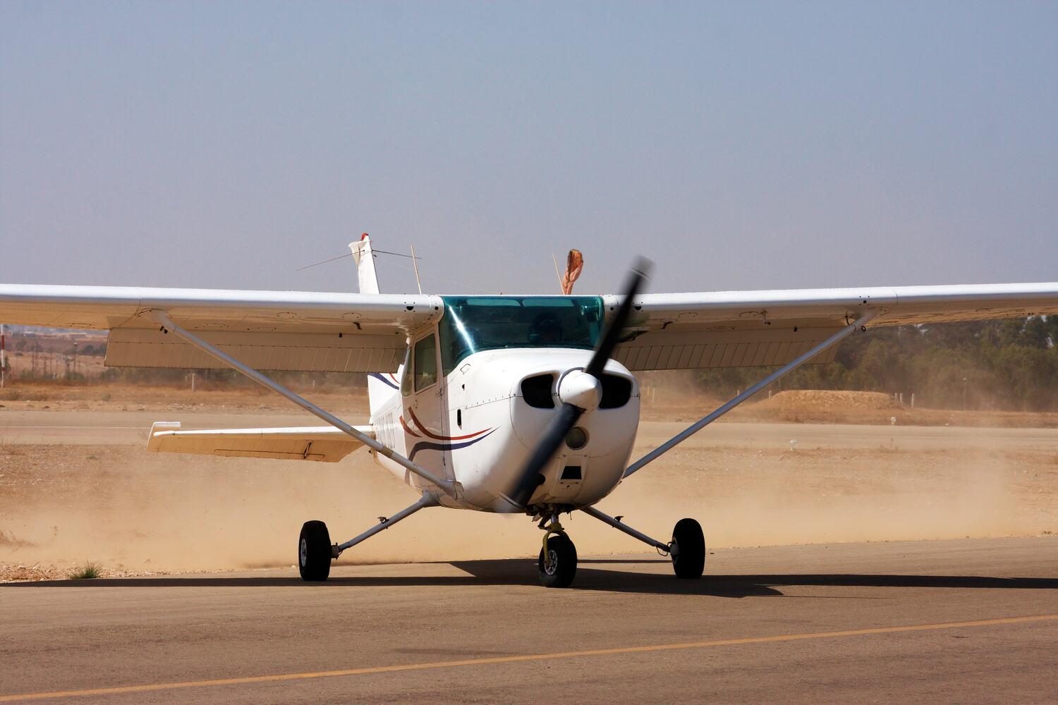 Light two-seat training airplane taxiing