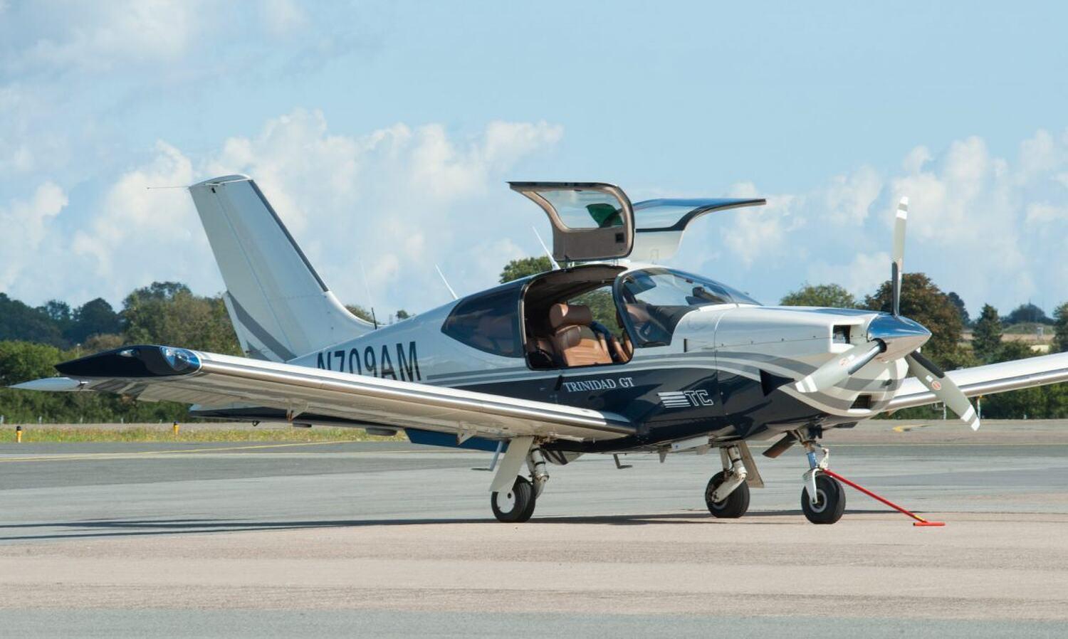 Twin-engine piston airplane on a ramp